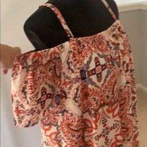 Off the shoulder dress with adjustable straps.